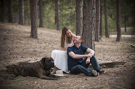 Engaged couple with their dog in the woods, Tennessee