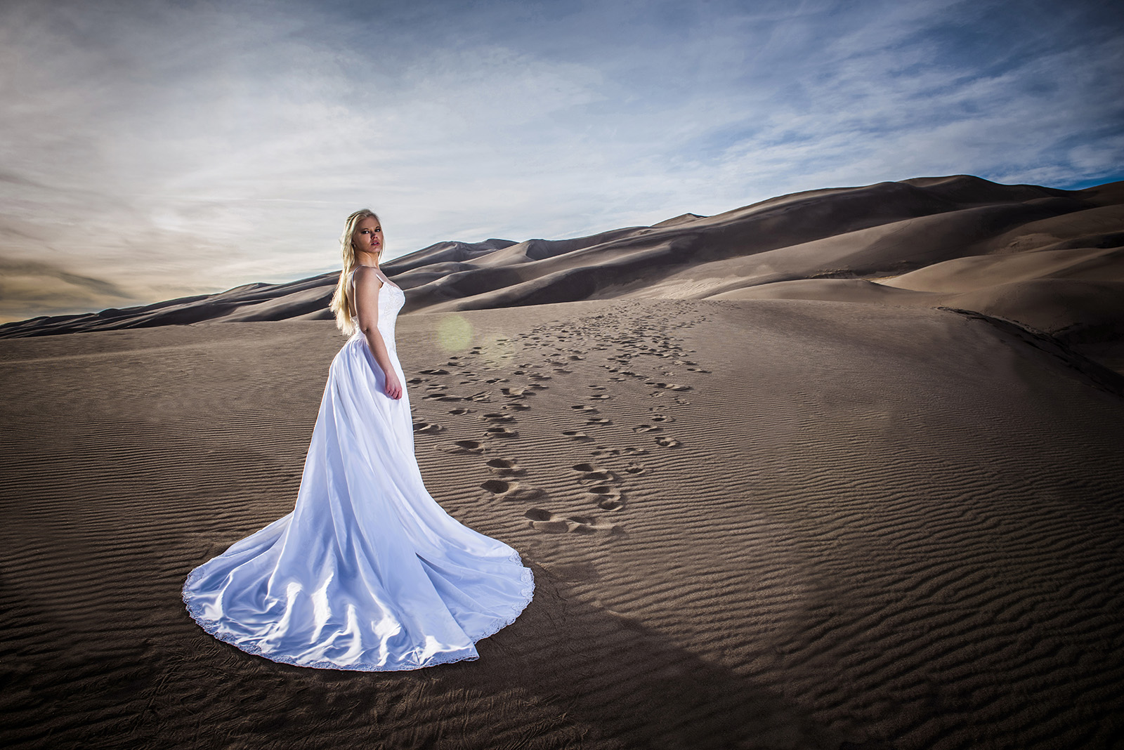 brody-hall-photography-bridal-dress-feature Sky in wedding dress at Great Sand Dunes