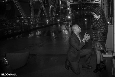 Rawood on bridge proposing to Paulina