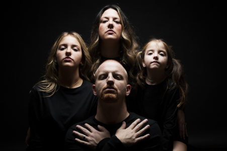 family-duplicating-album-cover Christmas car photo of family duplicating an album cover